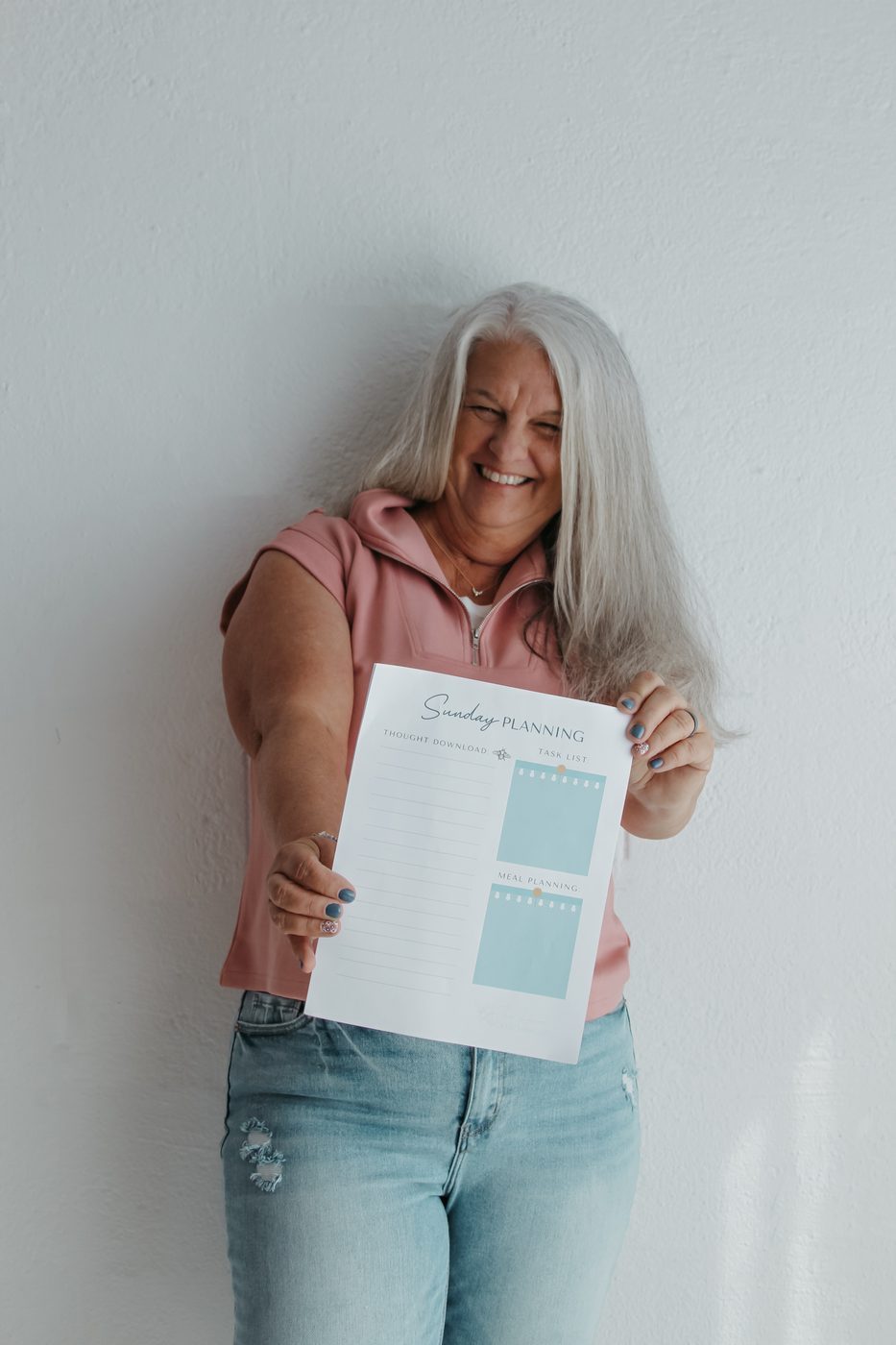 Brand photography, holding a branded planning printable