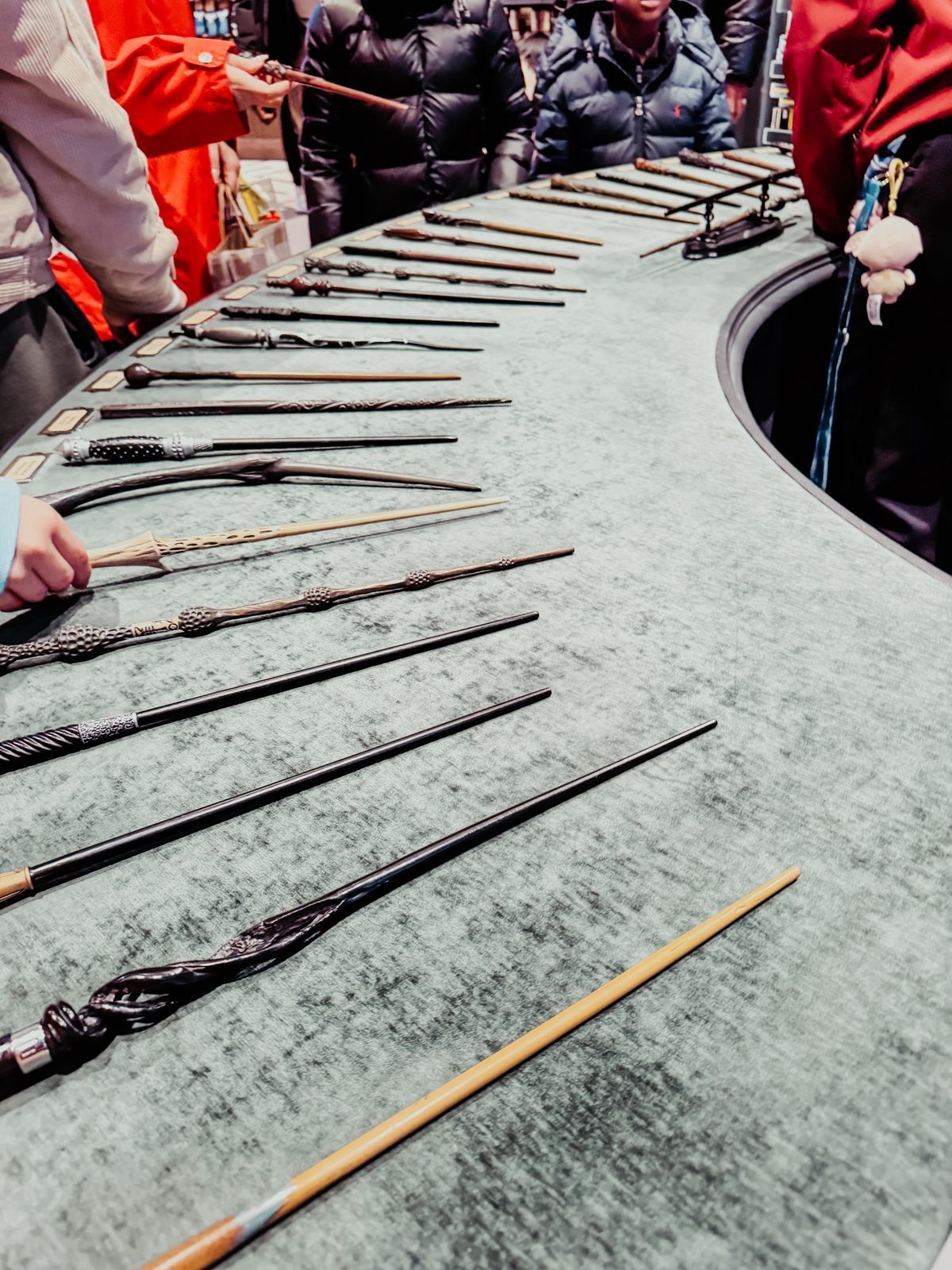 A counter of wands inside the Harry Potter store