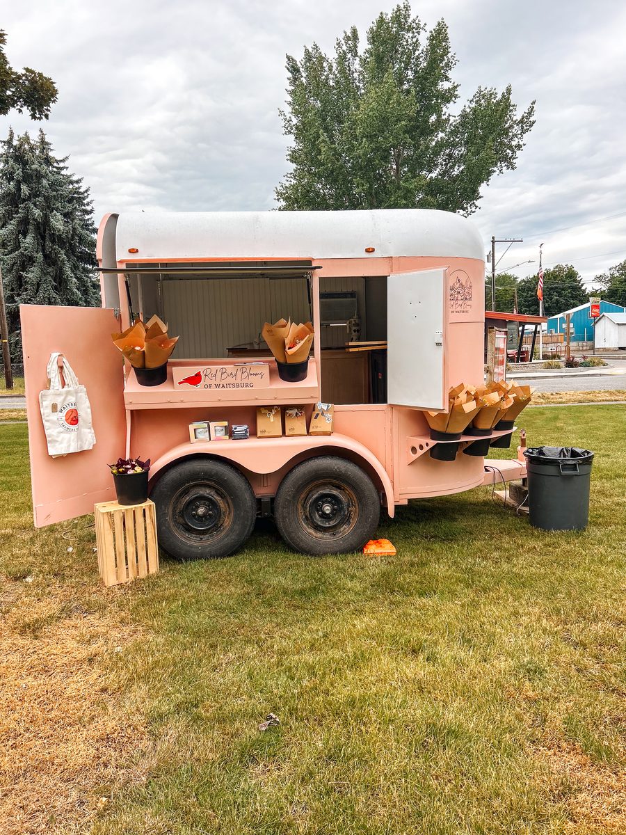 The Red Bird Blooms horse trailer converted into a market booth